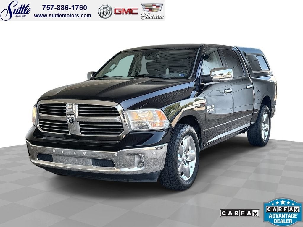 2016 RAM 1500 Big Horn in Black — front three-quarter view