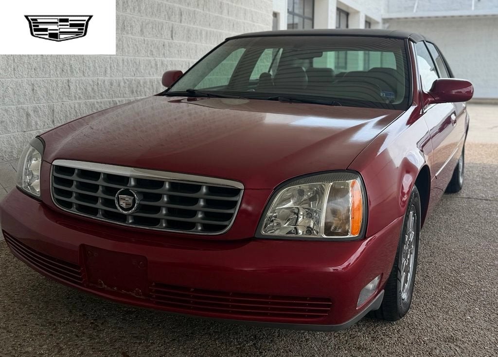2005 Cadillac Deville DHS in Crimson Pearl — front three-quarter view