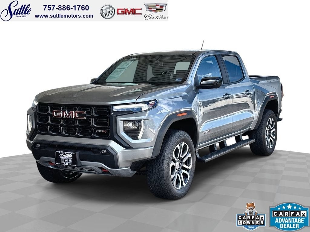 2023 GMC Canyon AT4 in Sterling Metallic — front three-quarter view