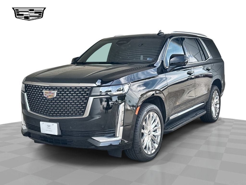 2021 Cadillac Escalade Premium Luxury in Black Raven — front three-quarter view