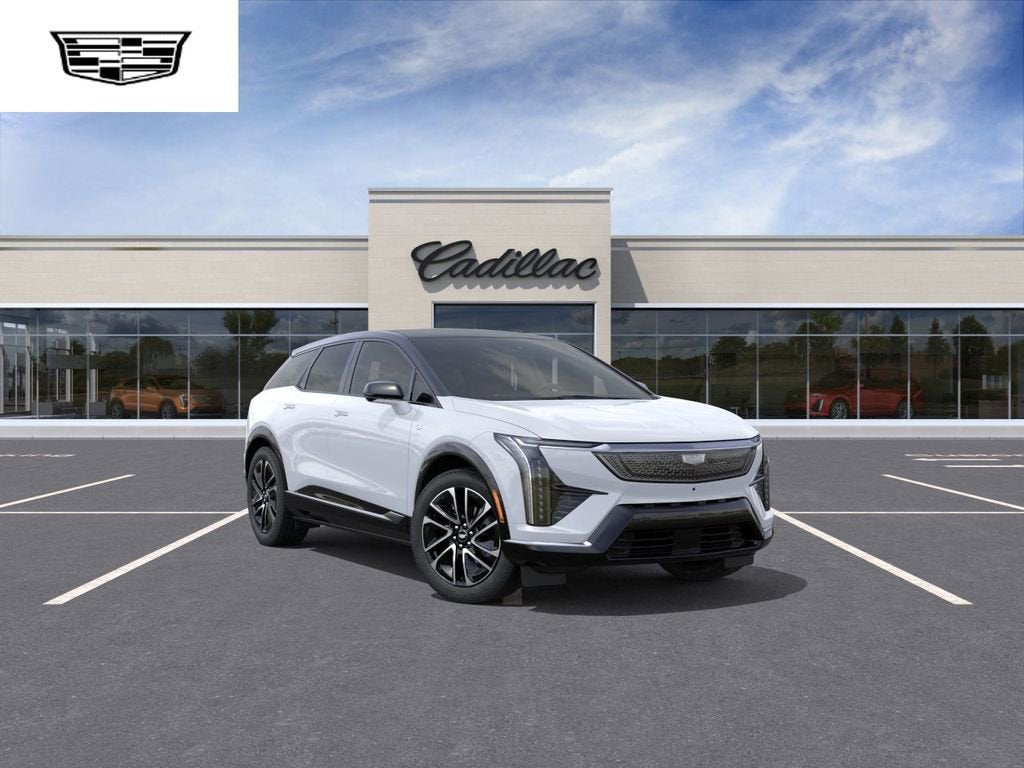 2026 Cadillac OPTIQ Premium Sport in Vibrant White Tricoat — front three-quarter view