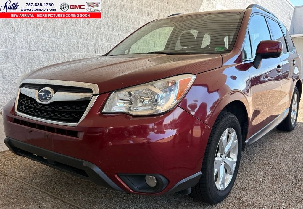 2014 Subaru Forester 2.5i Limited in Red — front three-quarter view